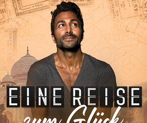 Biyon Kattilathu nach rechts oben schauend, im Vordergrund der Titel Eine Reise zum Glück.